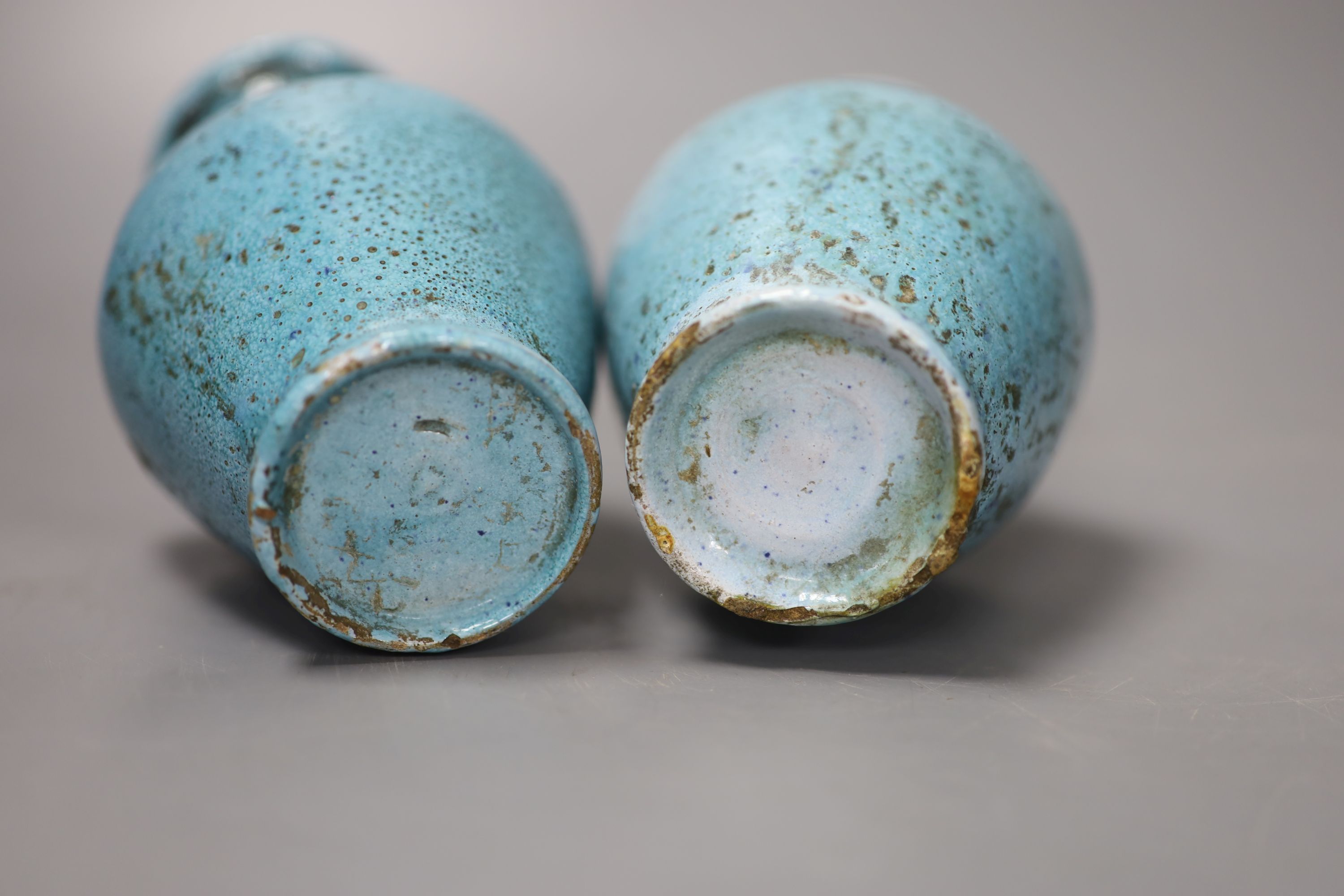 A pair of pale blue Eastern pottery vases, 16.5cm high